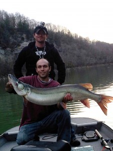 Ian Swenson with a 48" muskie from February, 2013. 